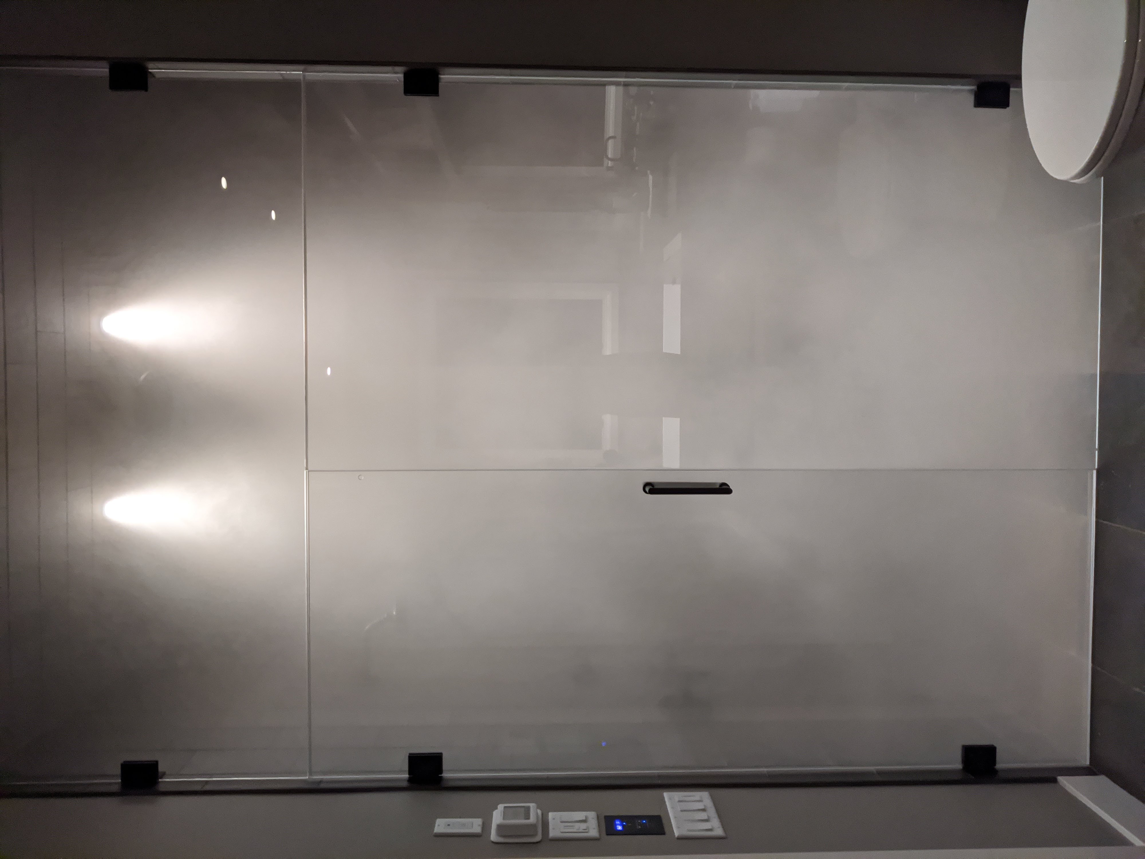 Primary bathroom steam shower with rain head